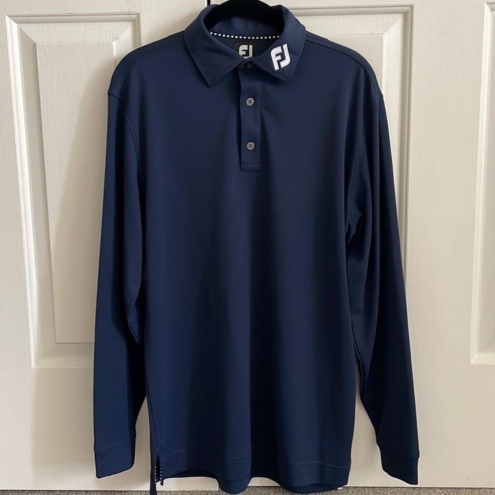Footjoy long sleeve mens polo in navy blue with FJ logo on collar. Size small